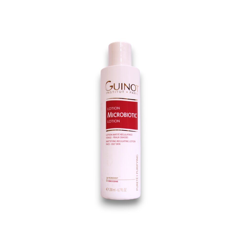 Guinot Microbiotic Lotion. Weiße Flasche mit rotem Etikett. Text: Lotion Microbiotic, für ölige Haut. 200ml.