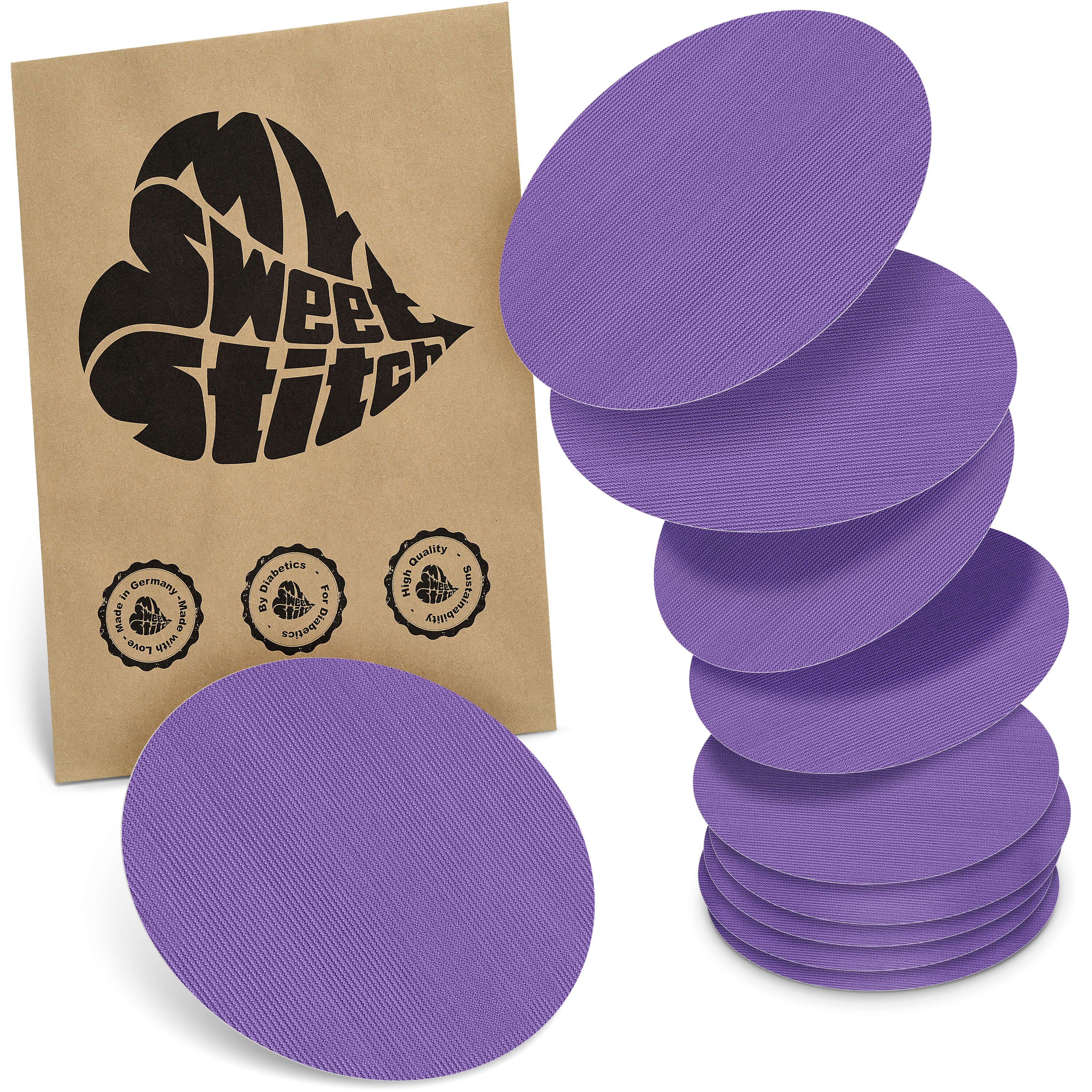 Packung mit Aufklebern. Lila, ovale Pflaster. Auf der Packung steht "My Sweet Stitch".