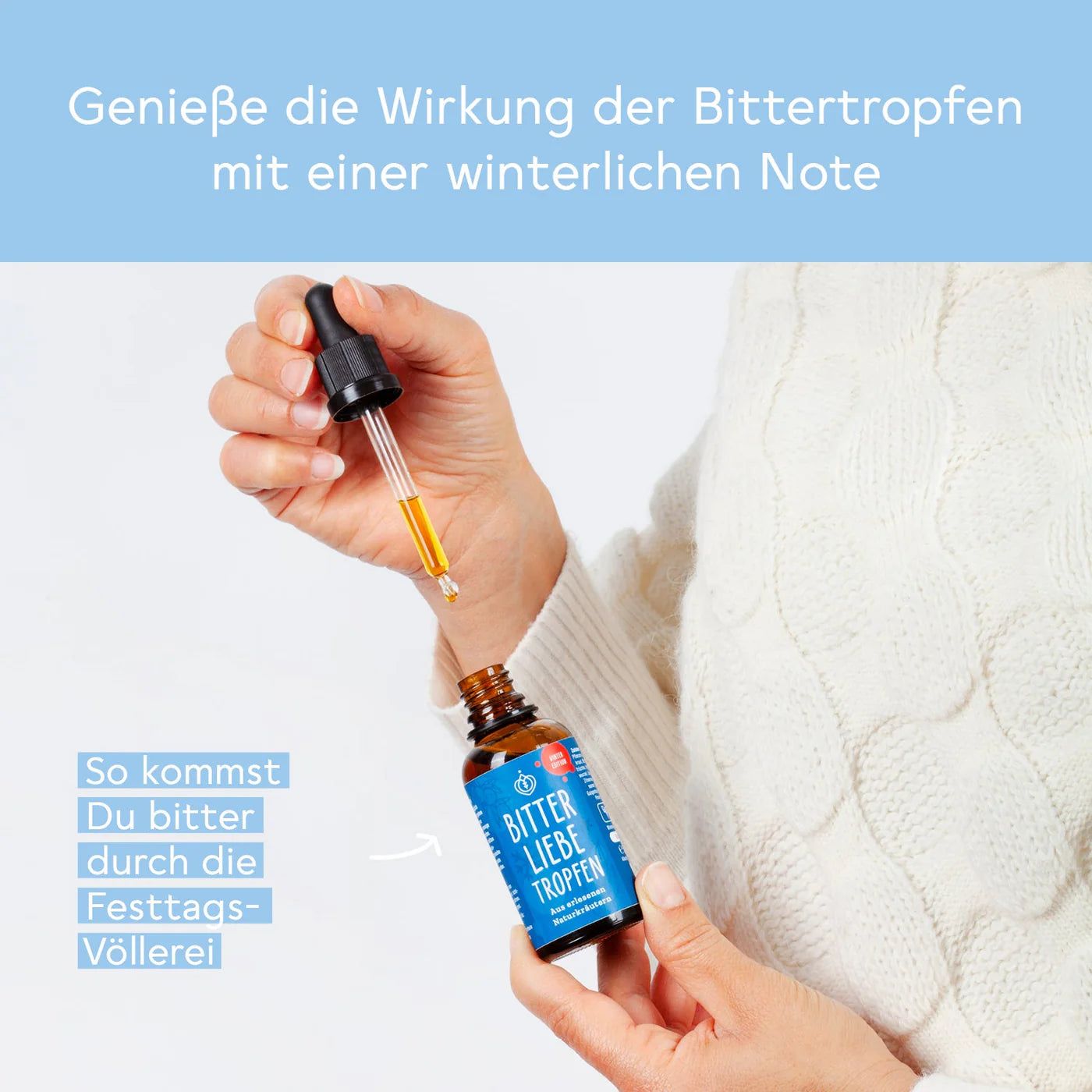 Hand hält eine braune Flasche mit blauer Etikette. Pipette wird in die Flasche gehalten. Text: BitterLiebe Tropfen.