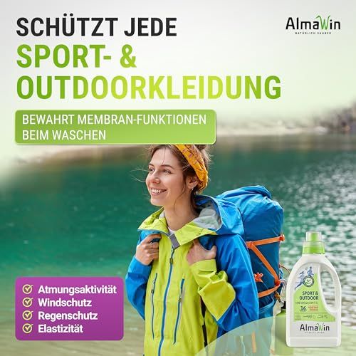 AlmaWin Sport & Outdoor Waschmittel Flasche neben einer Frau in Outdoor-Kleidung am See.