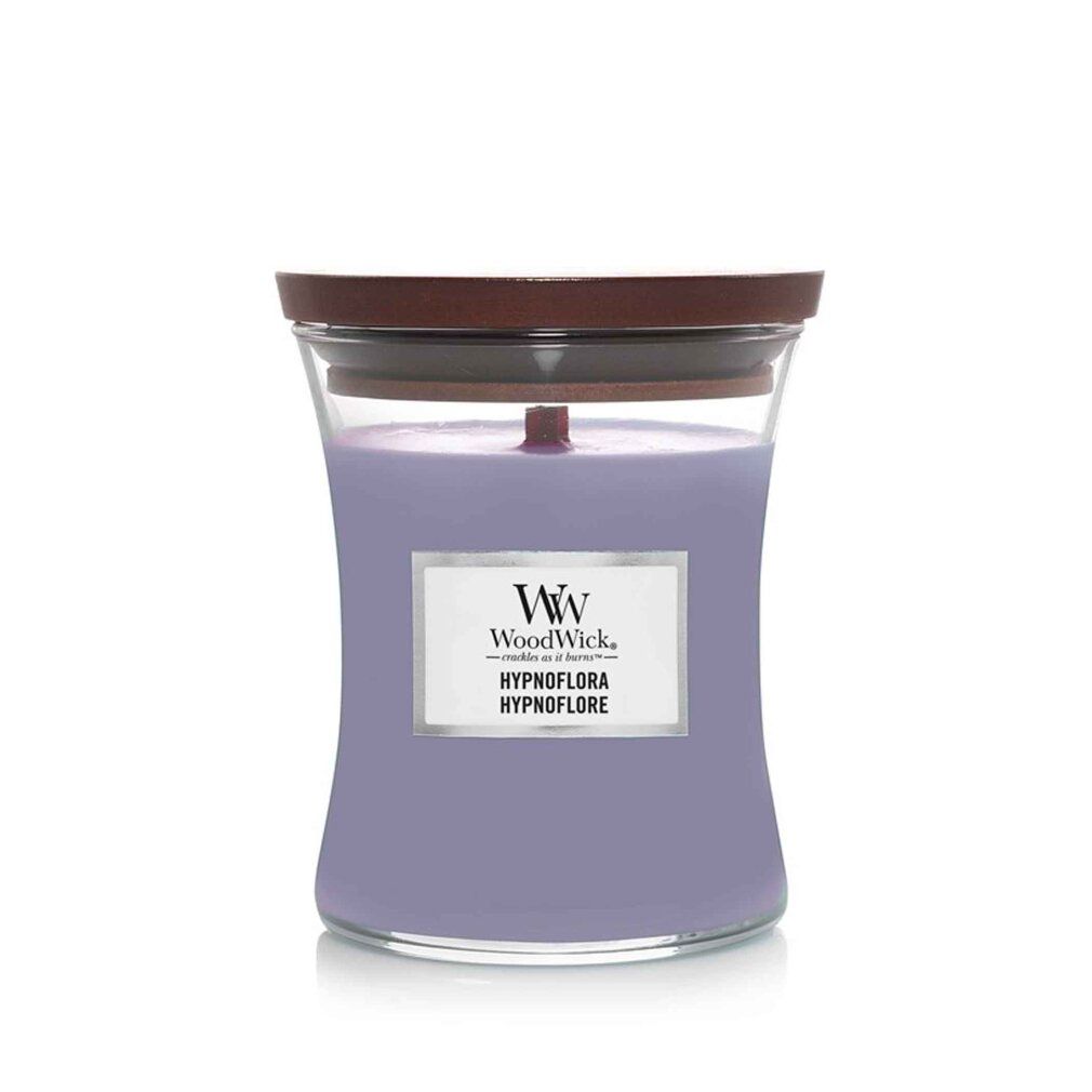 Kerze mit Holzdocht, Glasbehälter, Holzdeckel. Etikett mit "WoodWick", "HYPNOFLORA". Violette Wachsfarbe.
