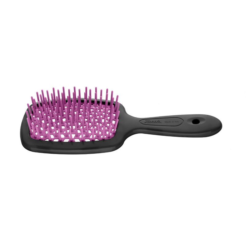 Schwarze Haarbürste mit pinkfarbenen Borsten. Griff mit Loch. Marke Janeke.
