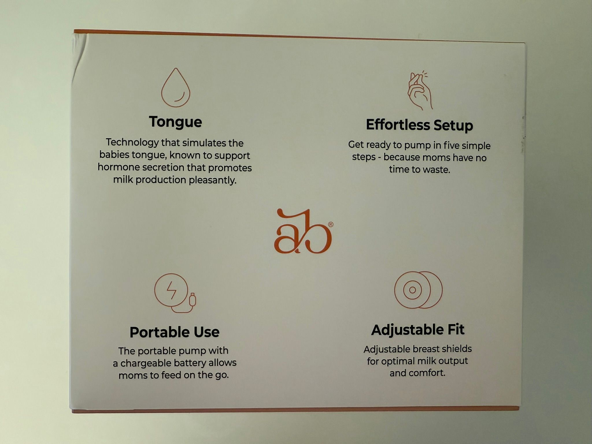 Rückseite der Verpackung. Text: Tongue, Effortless Setup, Portable Use, Adjustable Fit. Logo Annabella.