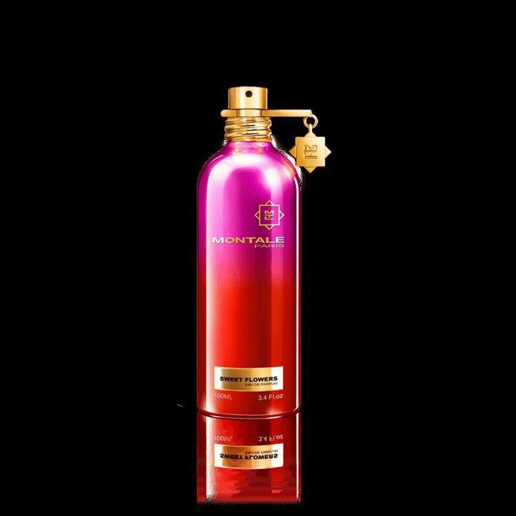 Montale Sweet Flowers Edp Spray. Farbverlauf von Pink nach Rot. Goldener Verschluss mit Anhänger. Schwarzer Hintergrund.