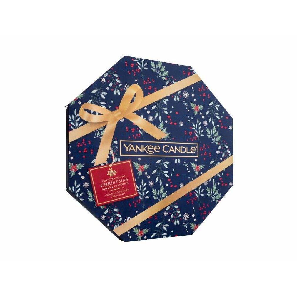 Achteckige Geschenkbox mit goldener Schleife und floralem Muster. Logo und rotes Etikett.