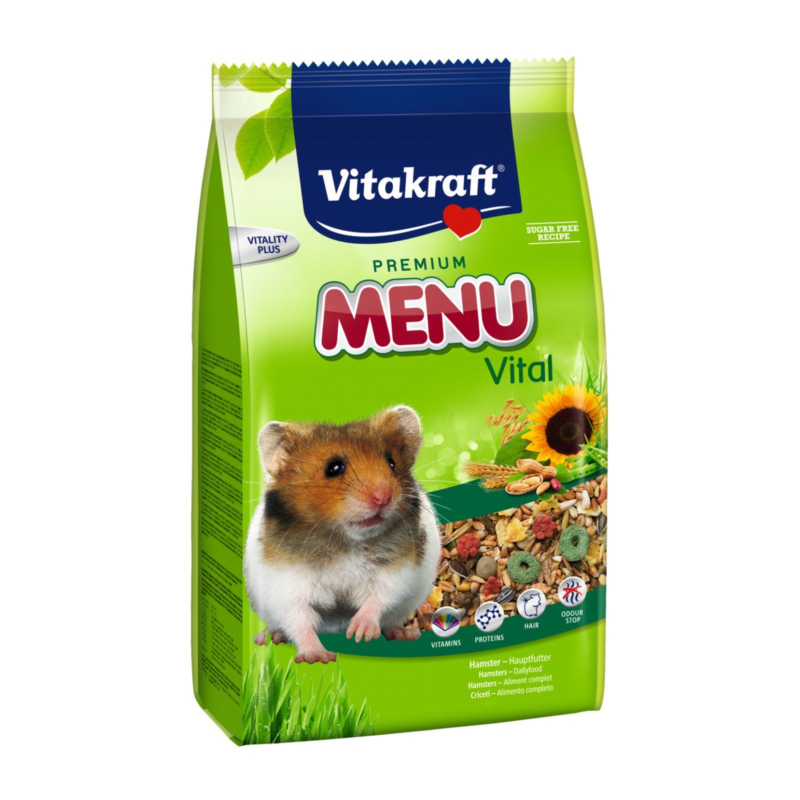Grüne Verpackung mit "Vitakraft Premium Menu Vital". Ein Hamster und Futterbestandteile sind abgebildet. "Zuckerfreie Rezeptur".