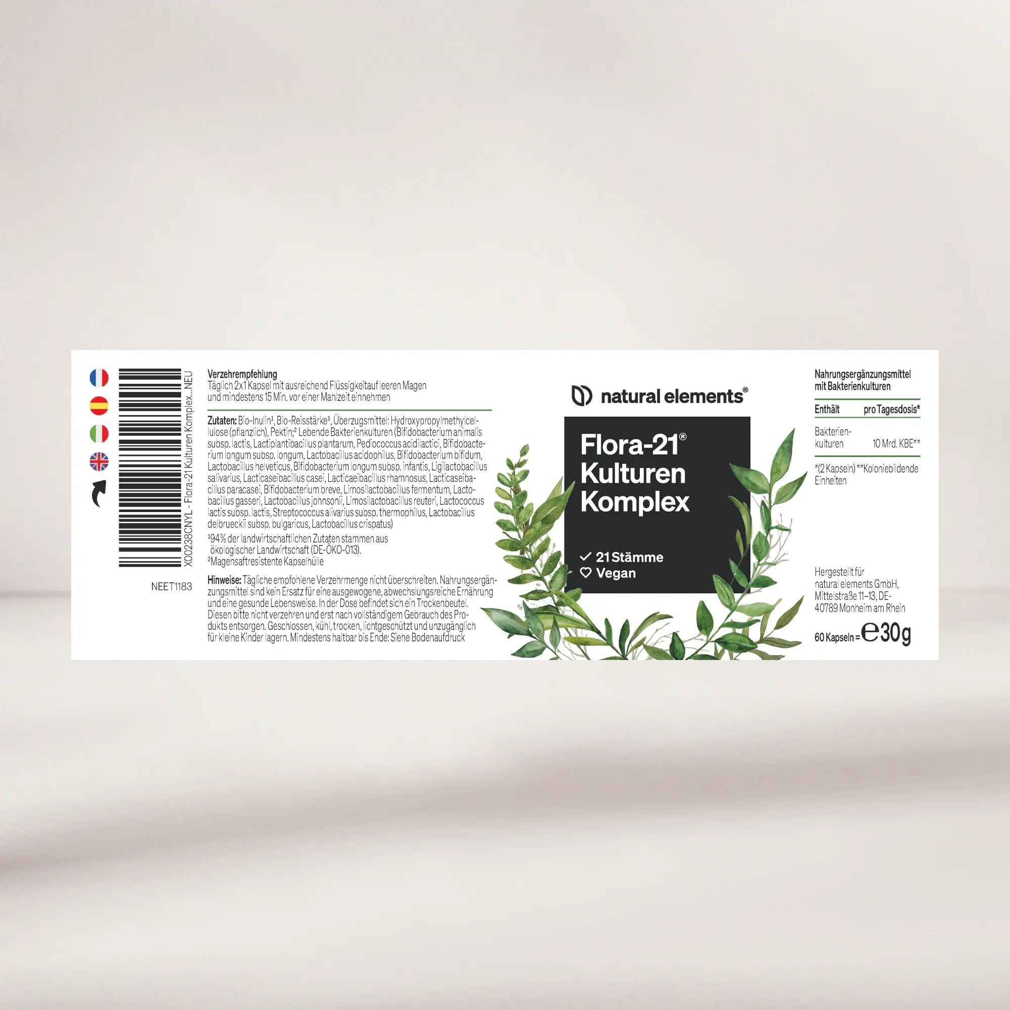 Weiße Verpackung mit Aufschrift Flora-21 Kulturen Komplex, 21 Stämme, Vegan. Grüne Blätter. Enthält 60 Kapseln.