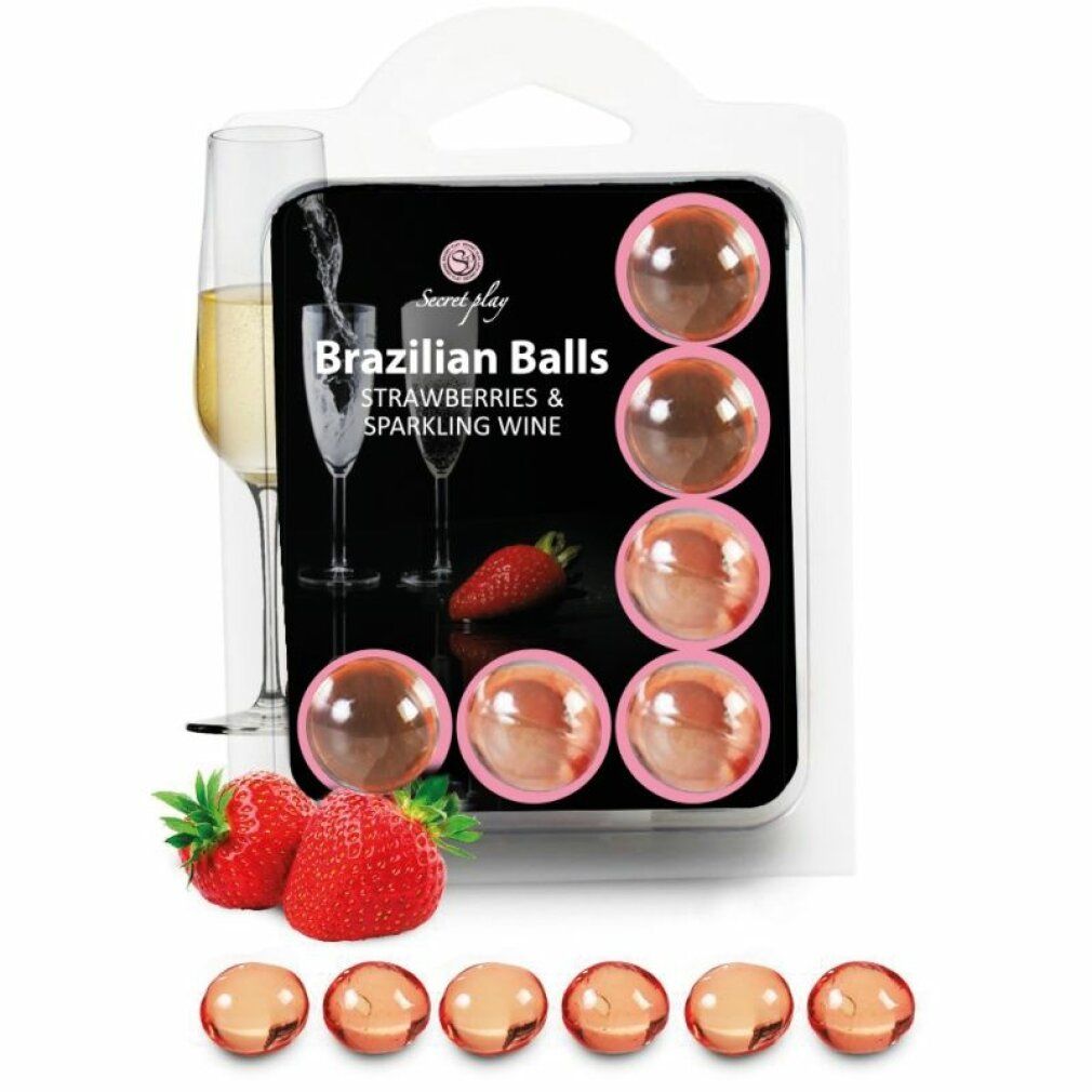 Blisterpackung mit sechs brasilianischen Kugeln. Erdbeer- und Sekt-Motiv. Transparente Kugeln in rosa Verpackung.