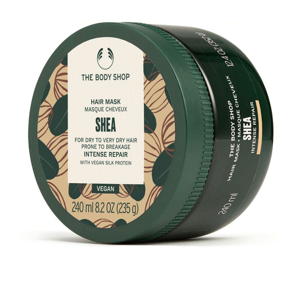 Grüne Dose mit SHEA Hair Mask. Enthält 240 ml. Vegan. The Body Shop Logo. Aufschrift: Intense Repair.