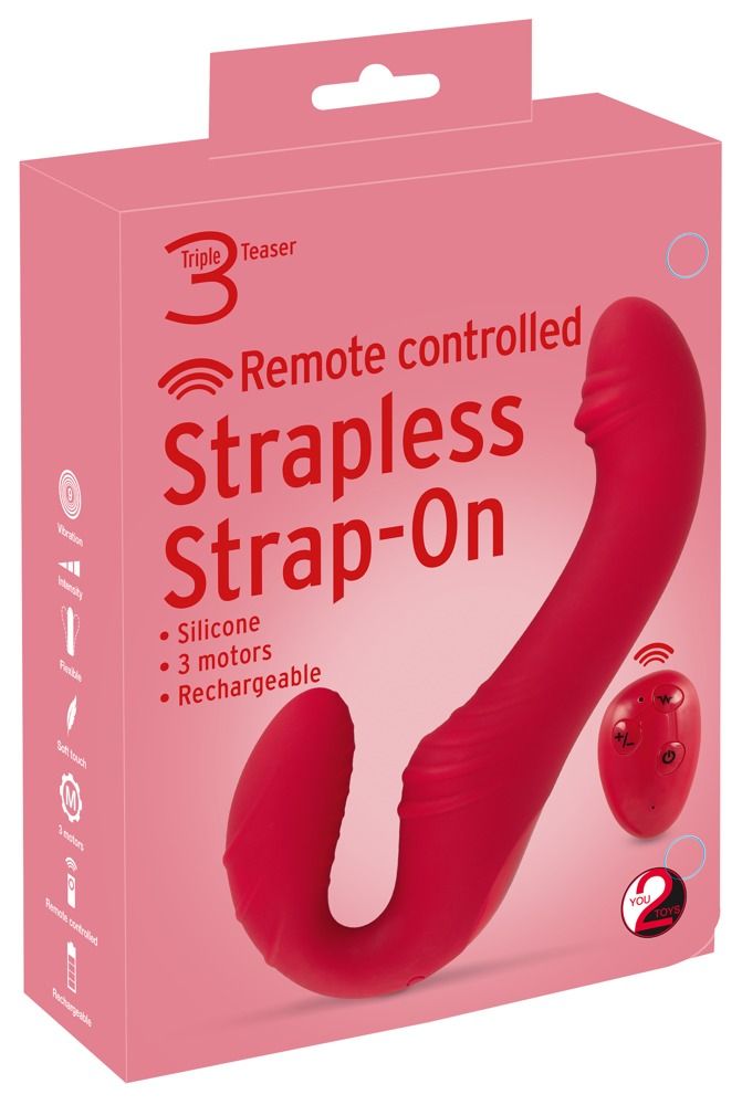 Verpackung. Roter Vibrator und Fernbedienung. Text: Strapless Strap-On, 3 motors, Rechargeable.