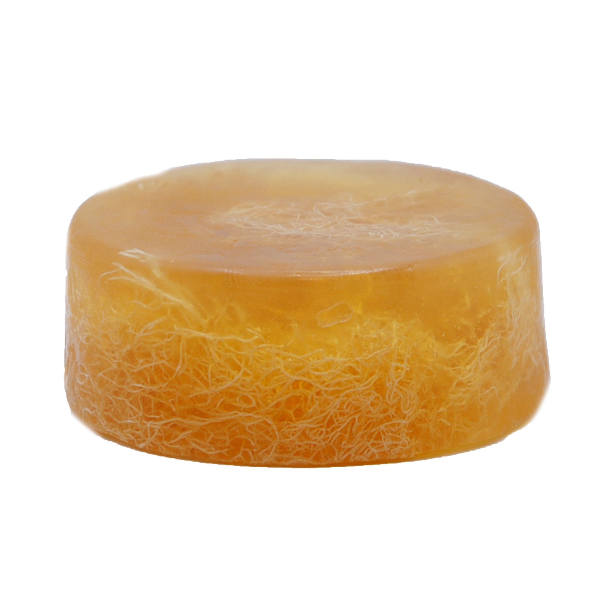Runde, bernsteinfarbene Seife mit sichtbaren Fasern. Hamam-Seife.