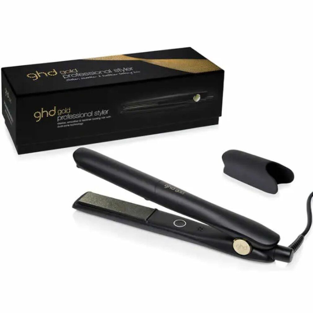 Schwarzes Glätteisen mit schwarzem Hitzeschutz und Verpackung. Aufschrift: ghd gold professional styler.