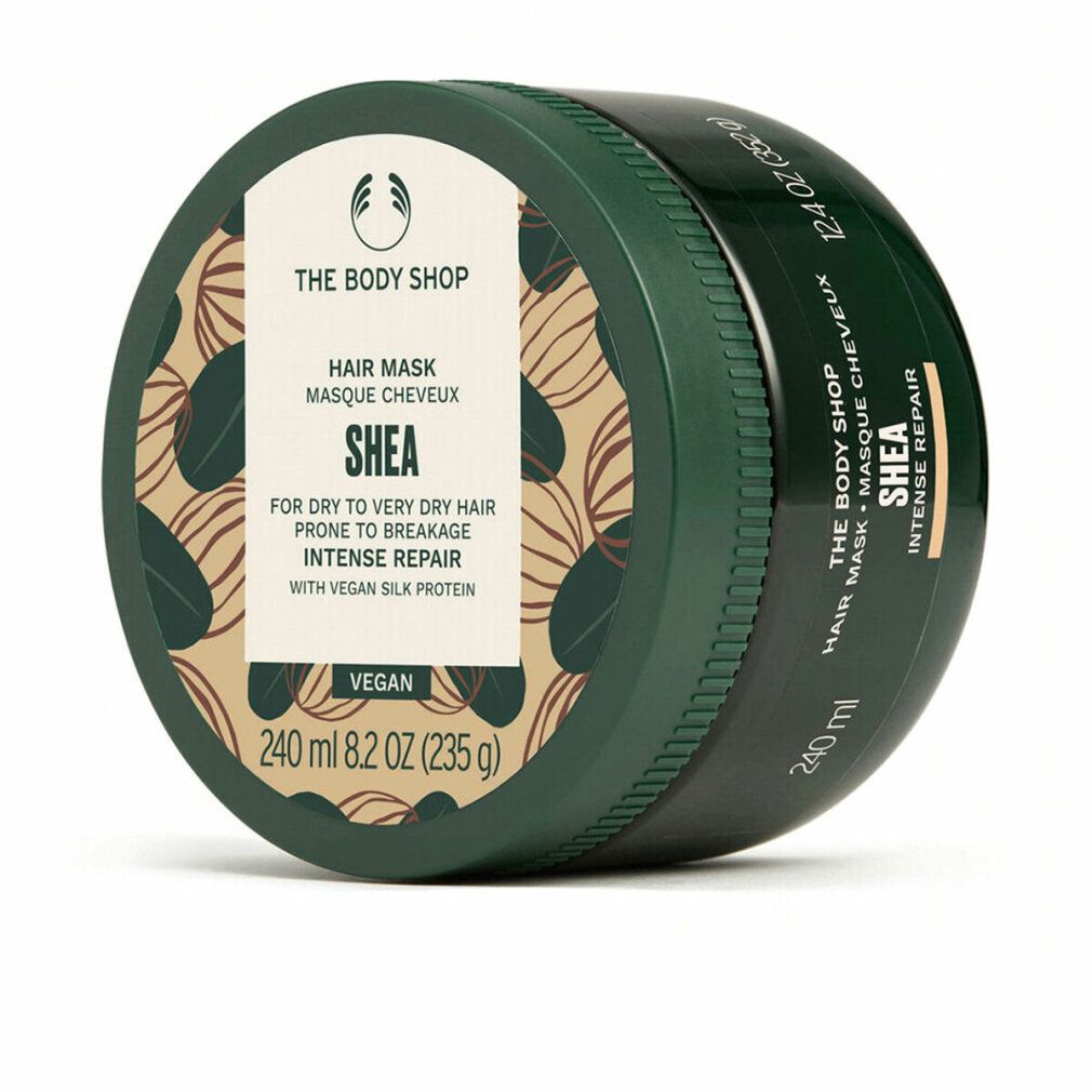 Grüne Dose mit SHEA Hair Mask. Enthält 240 ml. Vegan. The Body Shop Logo. Aufschrift: Intense Repair.