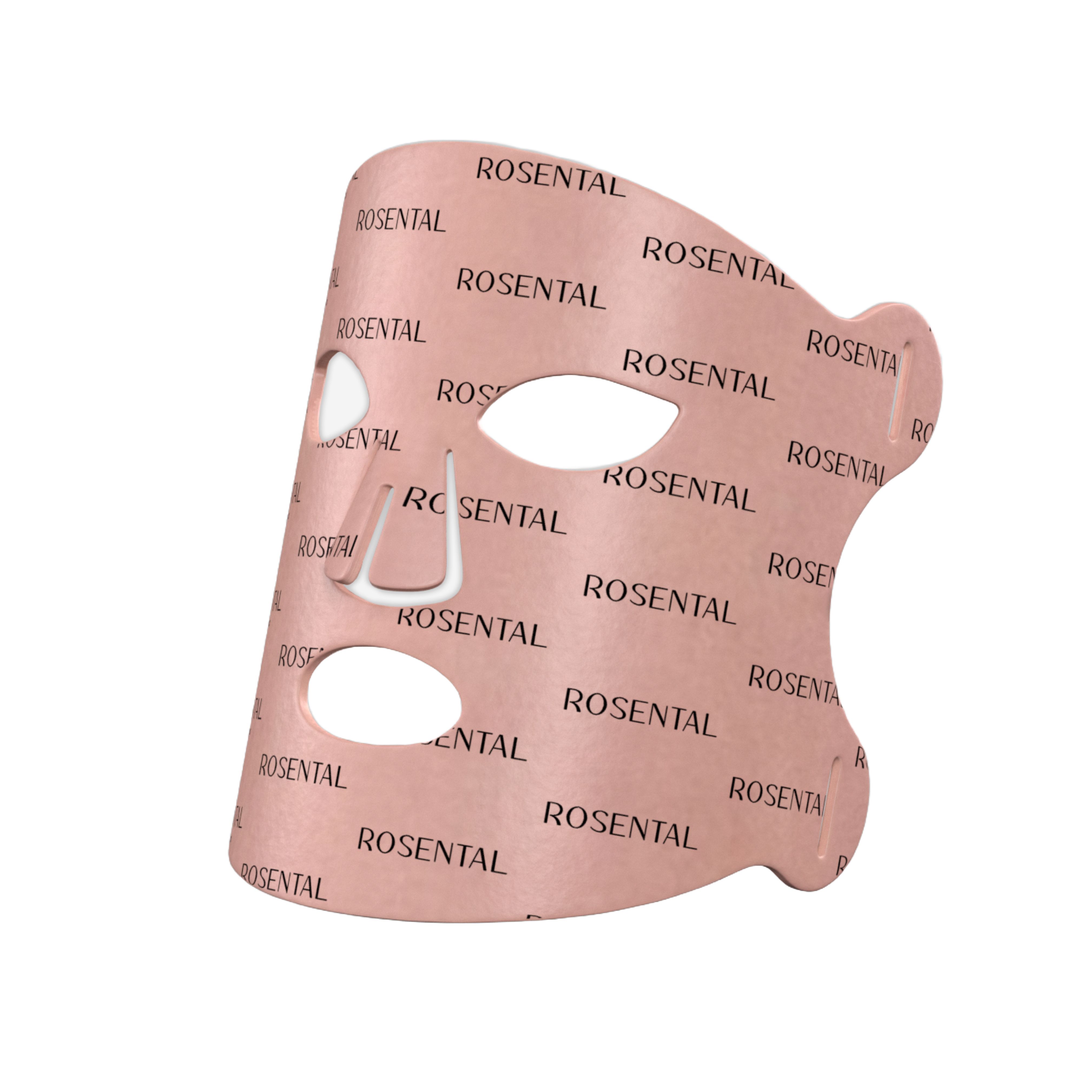 Rosa LED-Gesichtsmaske mit Aussparungen für Augen, Nase und Mund. Der Schriftzug ROSENTAL ist wiederholt aufgedruckt.