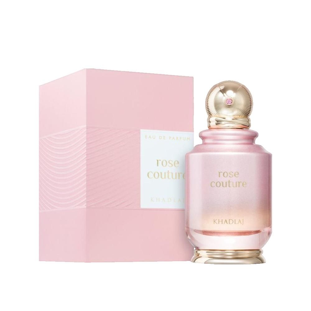 Rosa Parfumflasche mit goldfarbenem Verschluss und rosa Verpackung. Aufschrift: Rose Couture. Marke: Khadlaj.