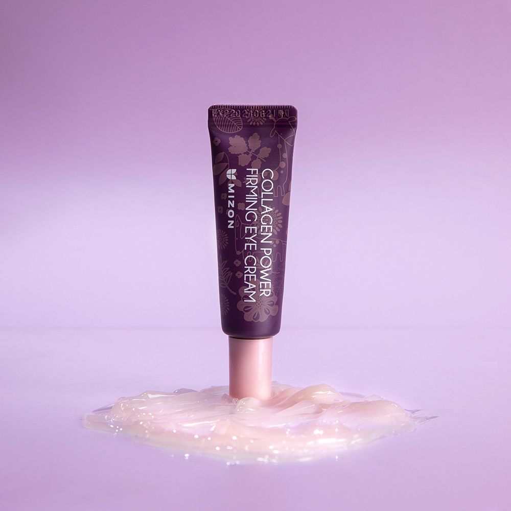 Lila Tube MIZON Collagen Power Firming Eye Cream. Rosa Kappe. Text: Collagen Power Firming Eye Cream. Produkt auf Creme.