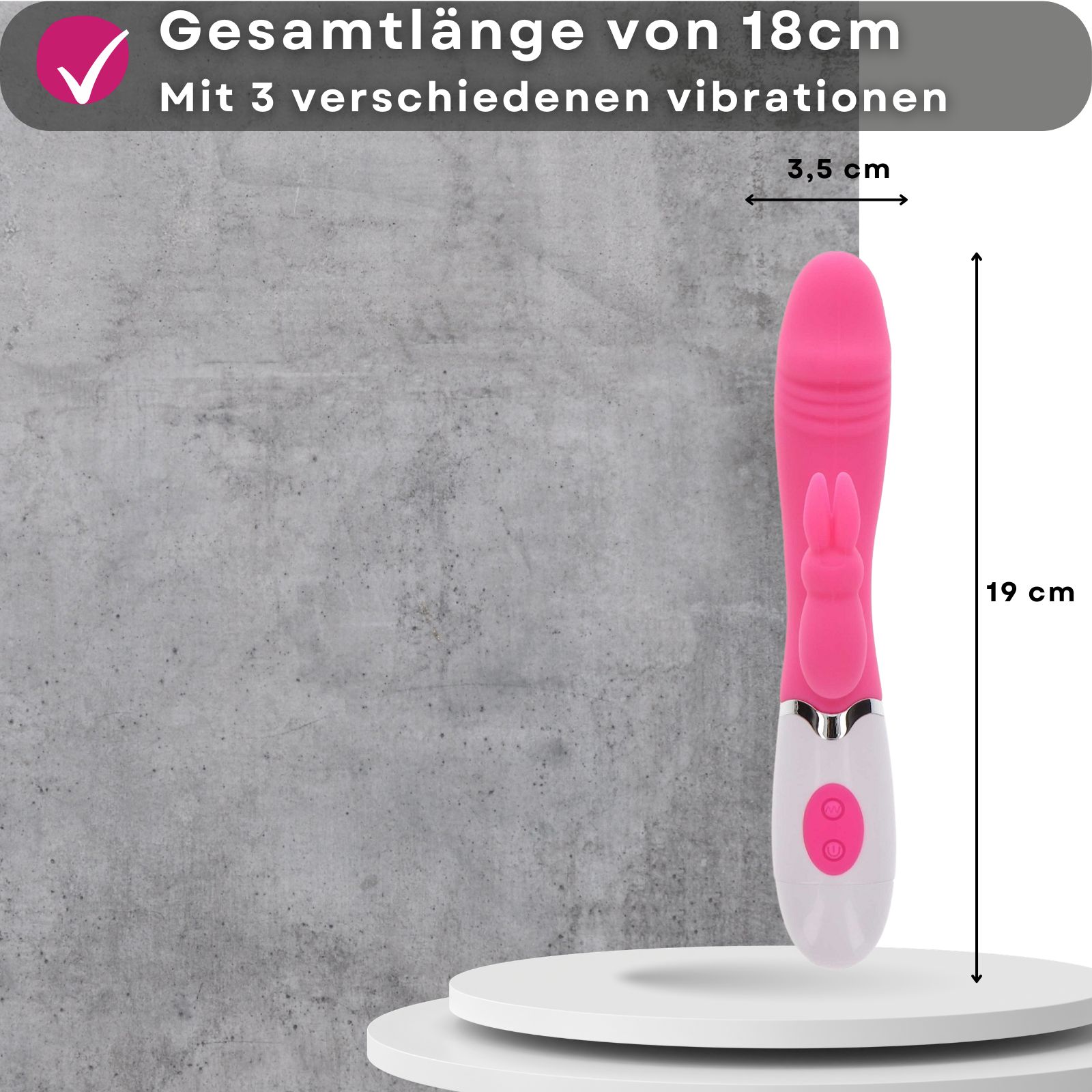 Rosa Vibrator mit Kaninchen-Design, 18cm lang, 3,5cm Durchmesser. Produkt auf weißer Oberfläche. Hintergrund: graue Wand.