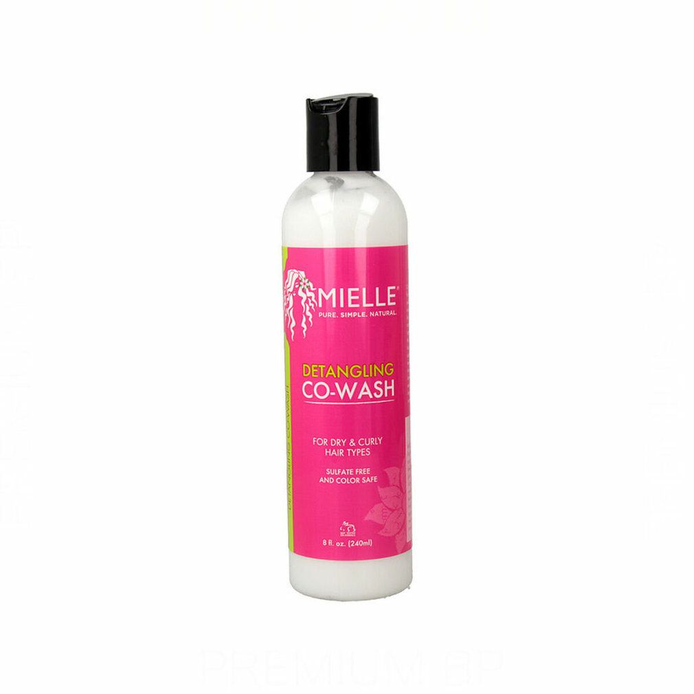 Flasche mit schwarzem Deckel. Etikett mit Produktname und Logo. Rosa und grüne Farben. Text: Detangling Co-Wash.