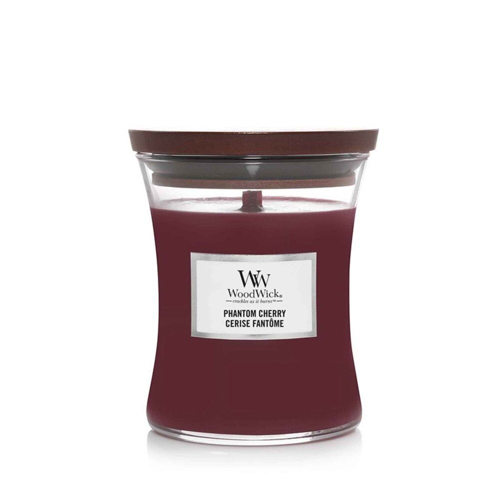 Glasbehälter mit roter Flüssigkeit und Holzdeckel. Etikett mit "WoodWick" und "Phantom Cherry".