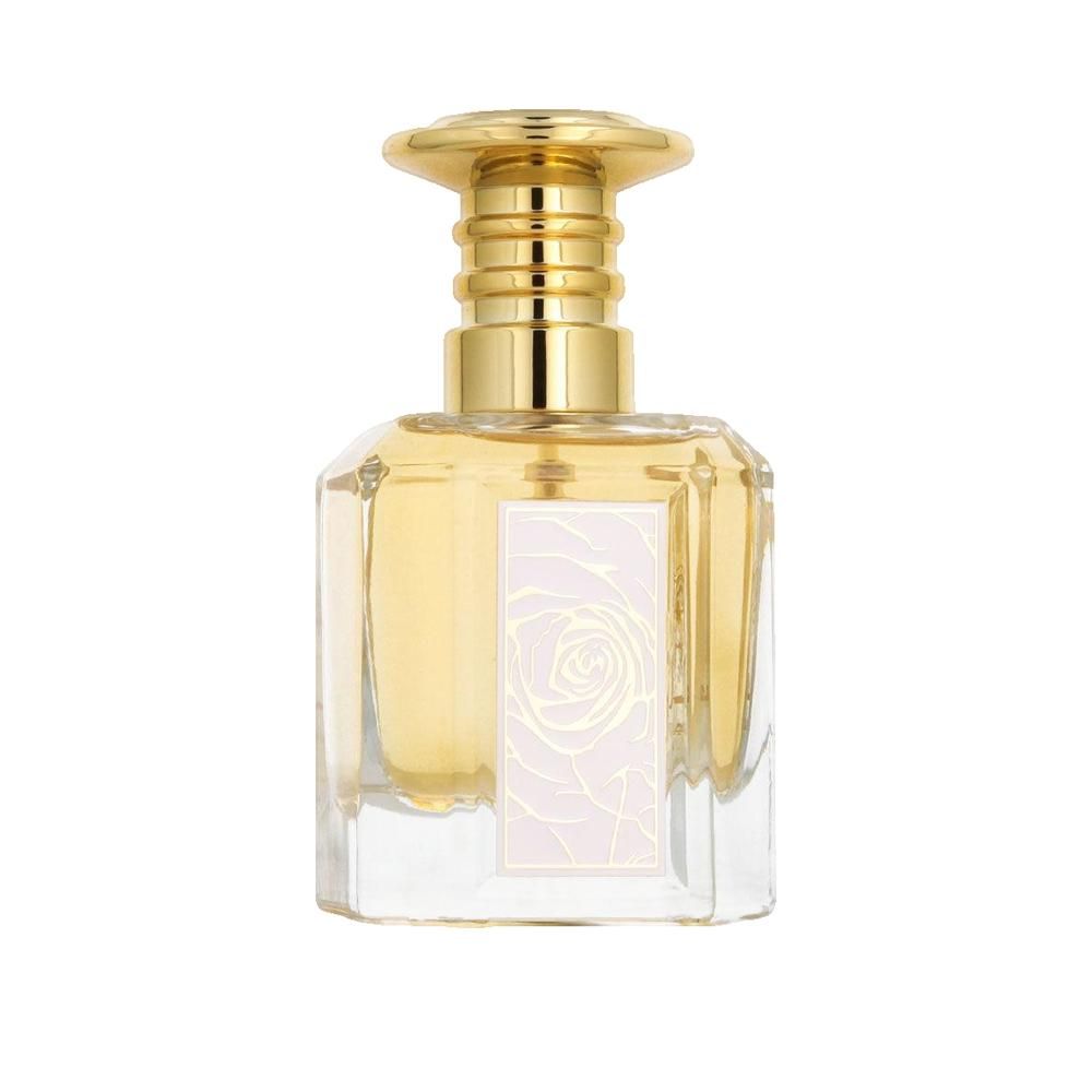 Parfümflakon mit goldfarbenem Verschluss. Auf dem Flakon ist eine weiße Rose abgebildet. Quadratische Form.