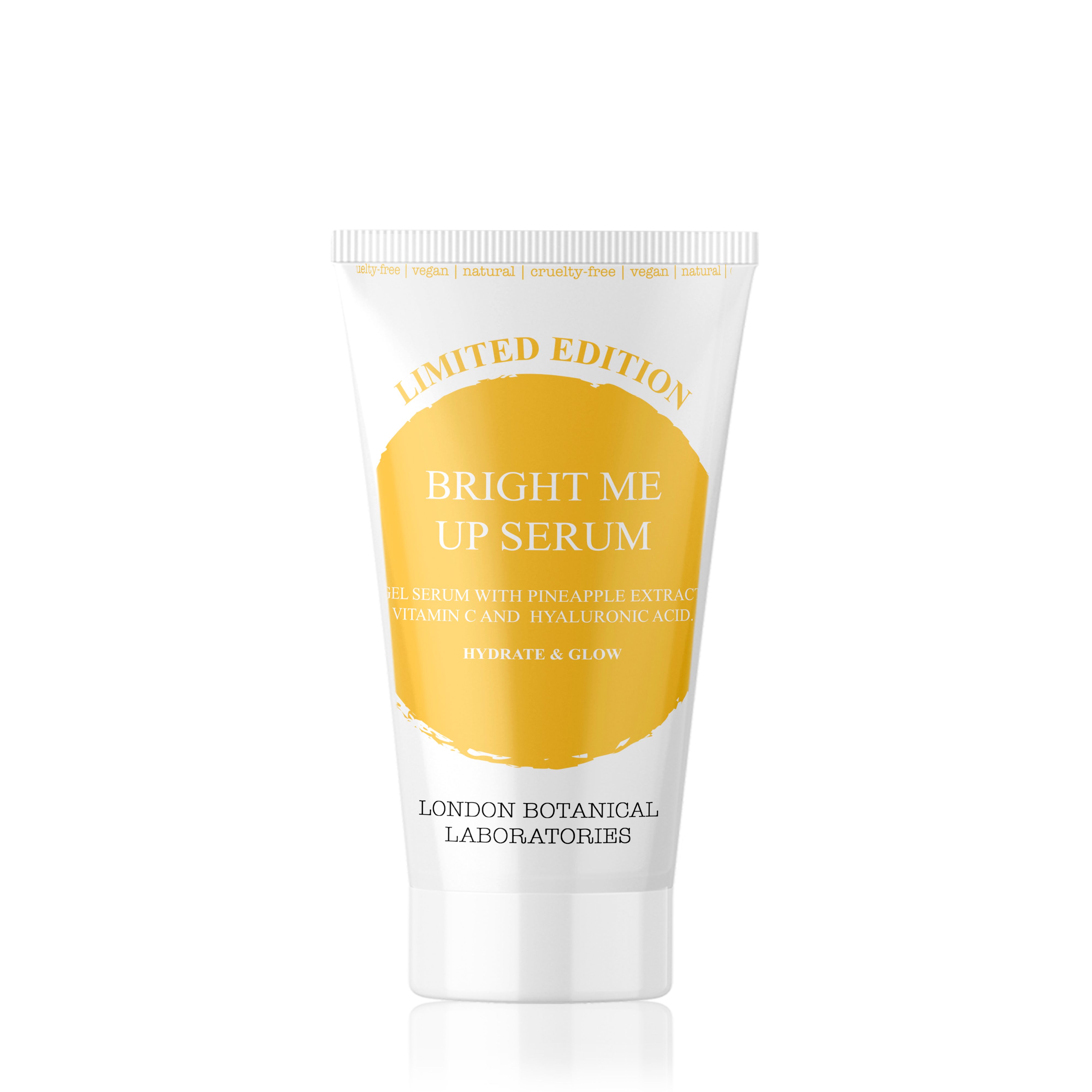 Weiße Tube mit gelbem Kreis und Produktnamen. Aufschrift: Bright Me Up Serum, London Botanical Laboratories. Mit Aufdrucken.