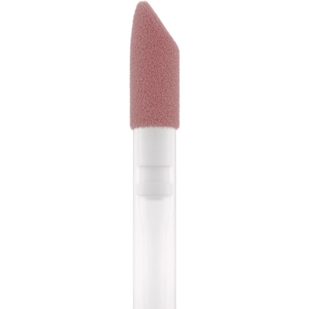 Nahaufnahme des Applikators eines Lipgloss. Schwammförmiger Applikator in Rosa.