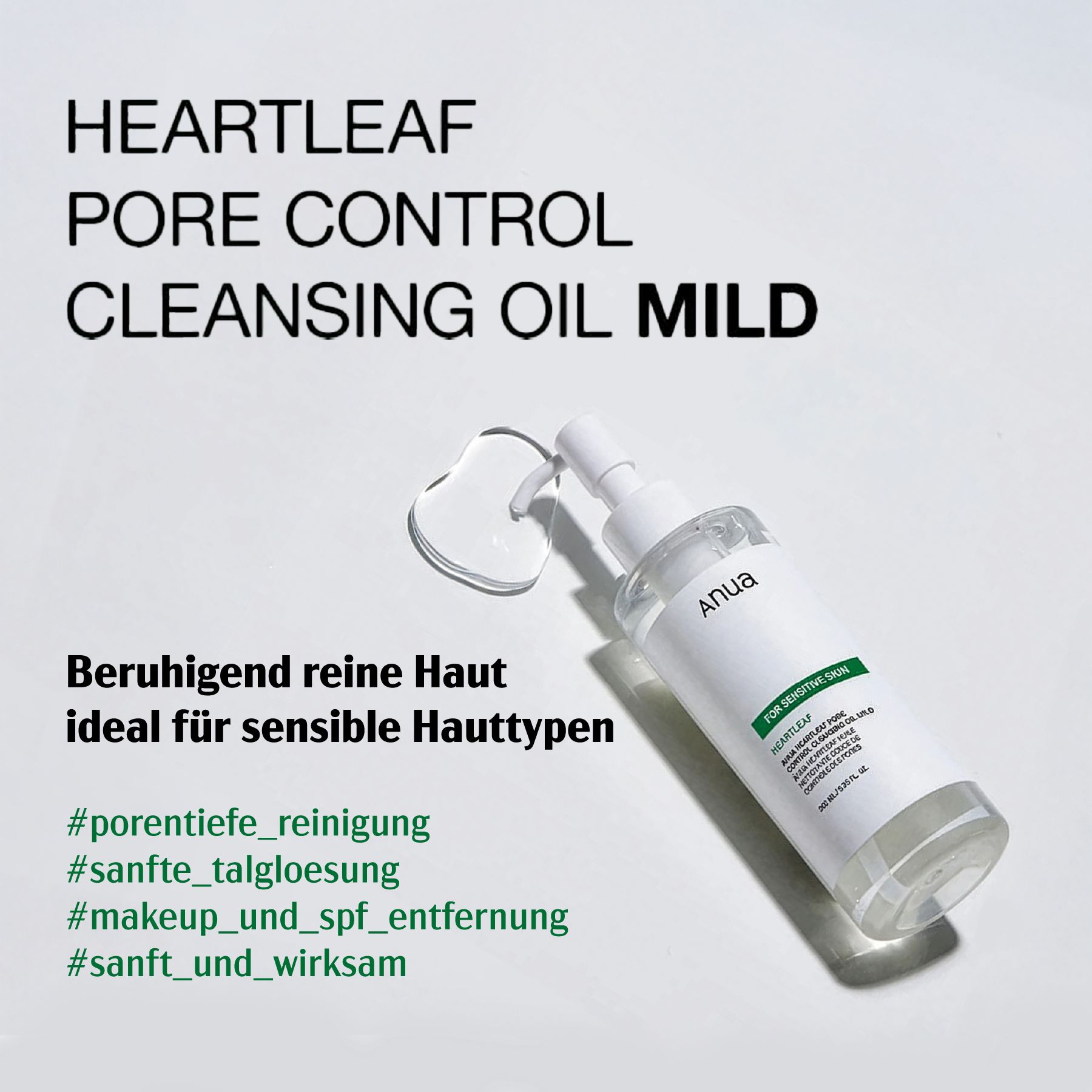 Klarflasche mit weißem Pumpkopf. Text: HEARTLEAF PORE CONTROL CLEANSING OIL MILD. Tropfen Öl daneben. Text: Anua.