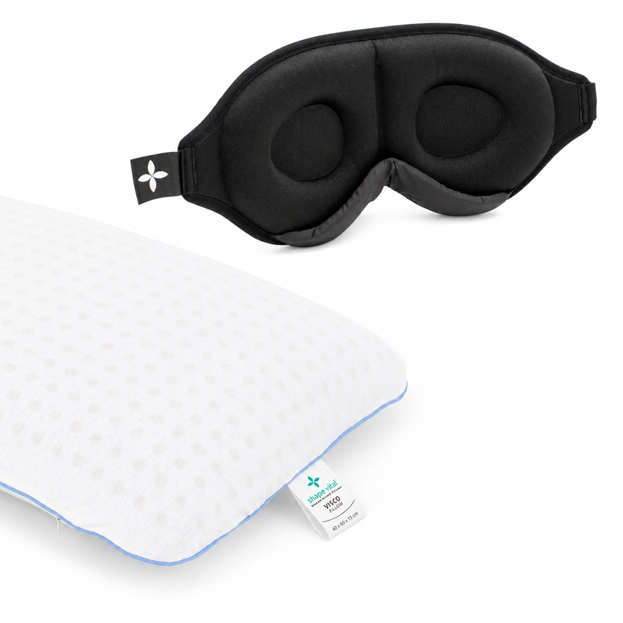 Ergonomisches Kissen und Schlafmaske, weißes Kissen mit blauen Akzenten, schwarze Maske.