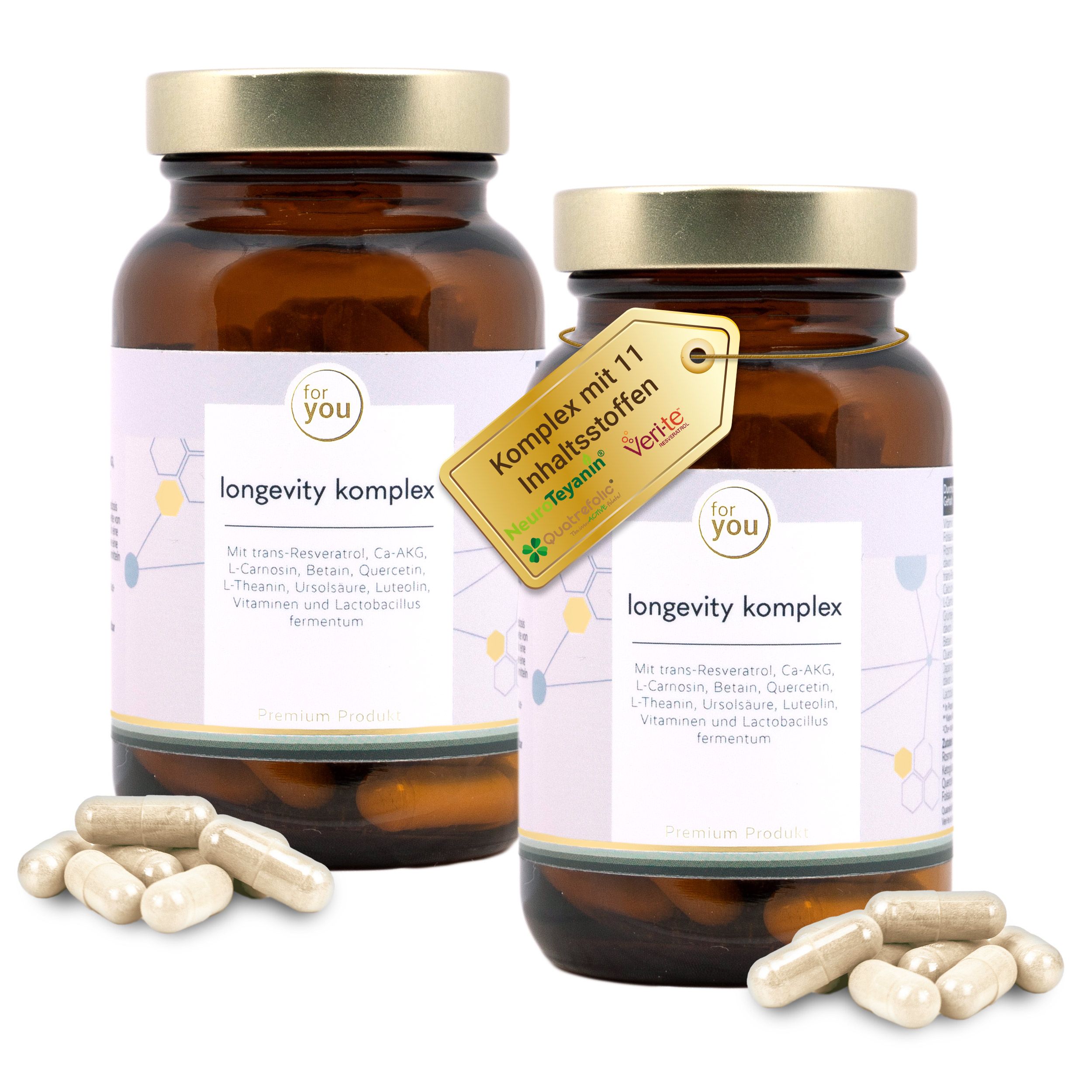 Zwei Braunglasflaschen des Longevity Komplex mit Kapseln. Eine Flasche ist geöffnet, Kapseln liegen davor.