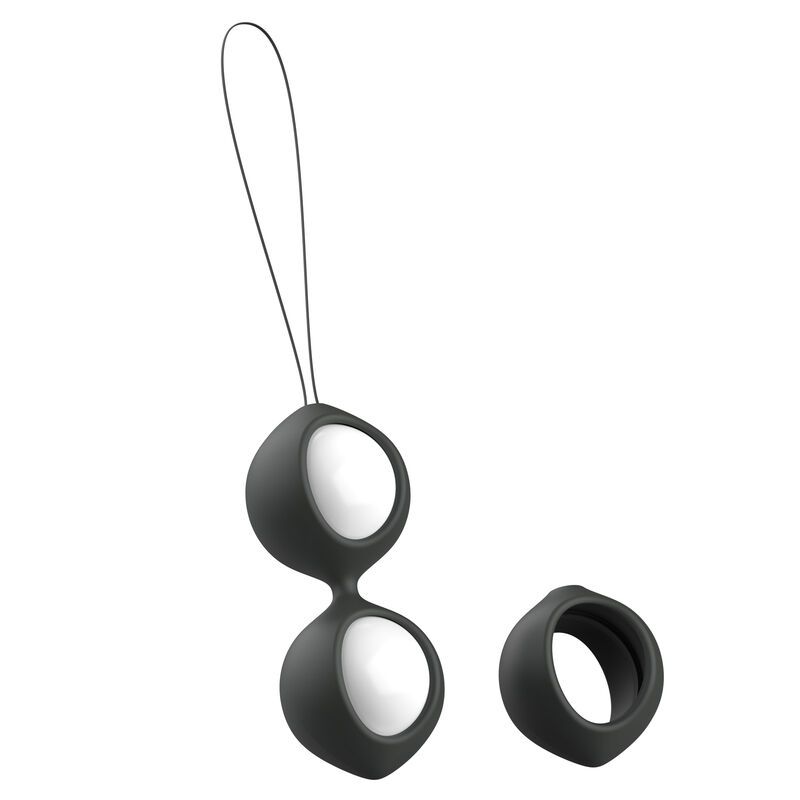 Zwei schwarze Kegelkugeln mit weißem Kern, verbunden durch eine Schlaufe. Ein schwarzer Ring liegt daneben.