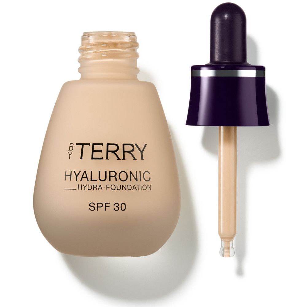 Flüssige Foundation-Flasche mit Pipette. Aufschrift: BY TERRY, Hyaluronic Hydra-Foundation, SPF 30. Beige Farbton.