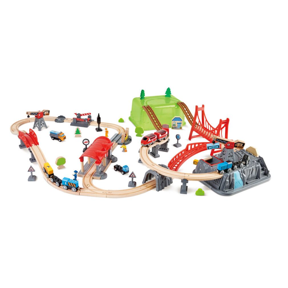Eisenbahn-Baukasten-Set mit Brücken, Gebäuden und Zügen. Enthält rote und braune Brücken, grüne Hügel und graue Felsen.