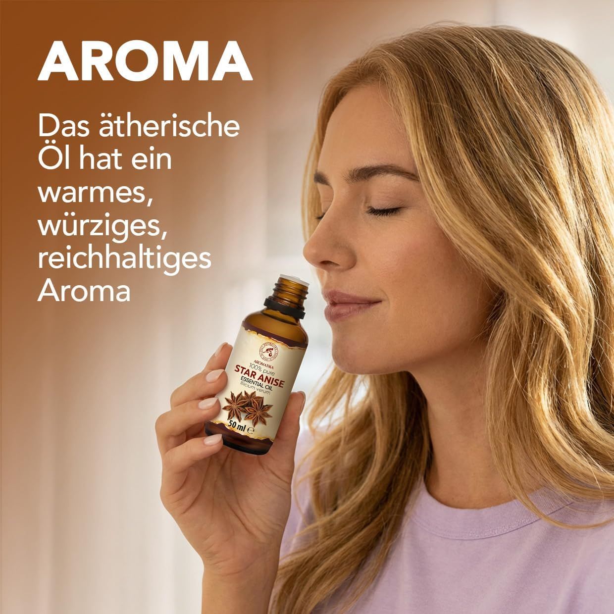 Sternanis ätherisches Öl: Frau riecht daran.