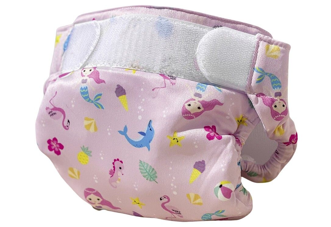 Schwimmwindel mit Meerjungfrauen-Muster, rosa. Klettverschlüsse, bedruckt mit Eis, Delfinen, Flamingos und Seepferdchen.