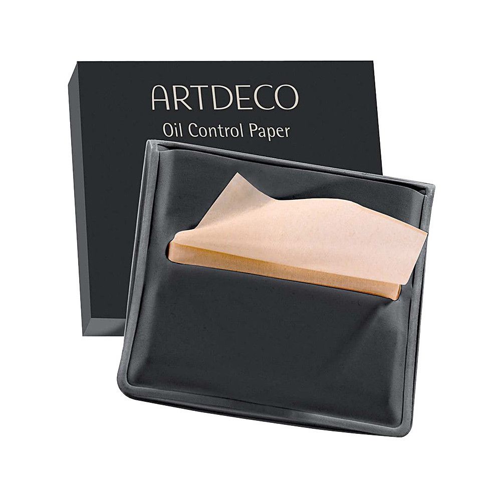 Schwarze Verpackung mit "ARTDECO Oil Control Paper"-Aufdruck. Ölpapiere in einem schwarzen Halter.