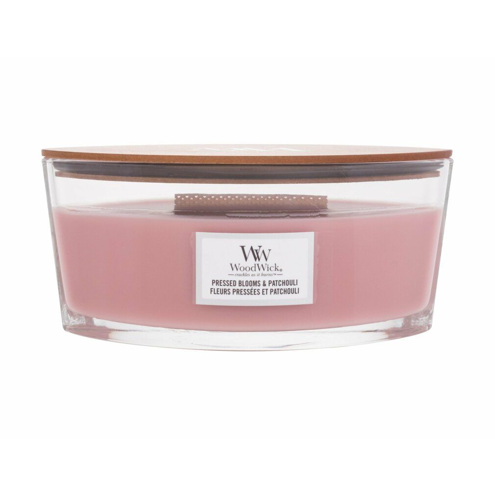 Rosa Kerze mit Holzdocht in Glasbehälter mit Holzdeckel. Label mit "WoodWick" und Produktbezeichnung.