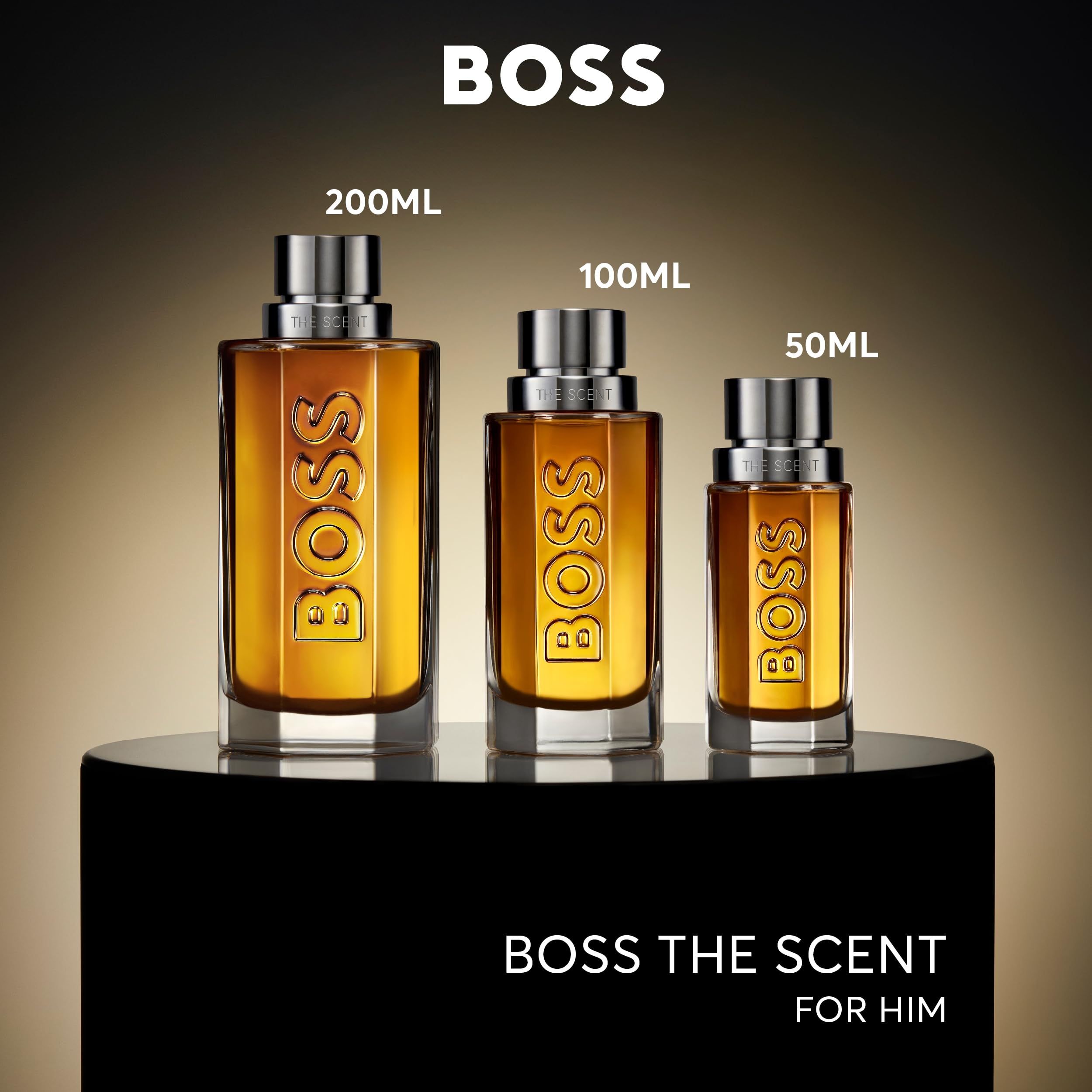Drei Flakons Hugo Boss The Scent Eau de Parfum in Größen 200ml, 100ml, 50ml.