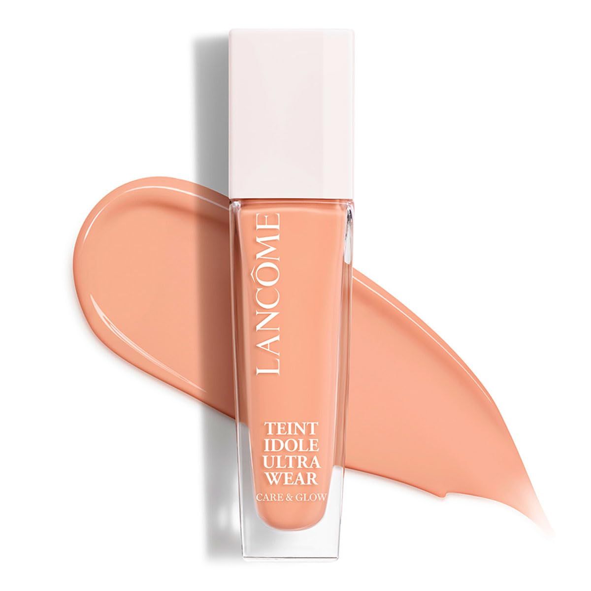 Flüssig-Make-up-Flakon mit Farbklecks. Aufschrift: Lancôme, Teint Idole Ultra Wear Care & Glow.