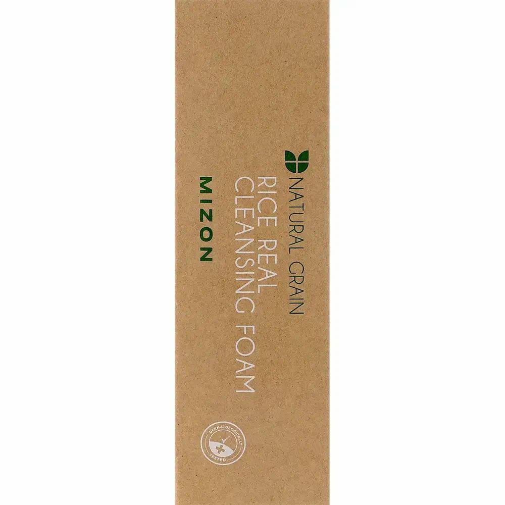 Kartonverpackung. Aufschrift: MIZON, Rice Real Cleansing Foam. Logo und Text: Natural Grain. Braune Farbe.