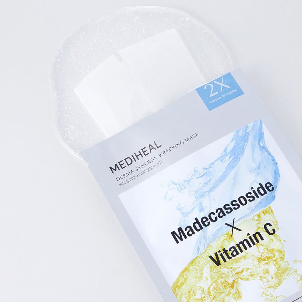 Verpackung mit zwei Gesichtsmasken. Aufschrift: Madecassoside X Vitamin C. Marke: MEDIHEAL Derma Synergy Wrapping Mask.