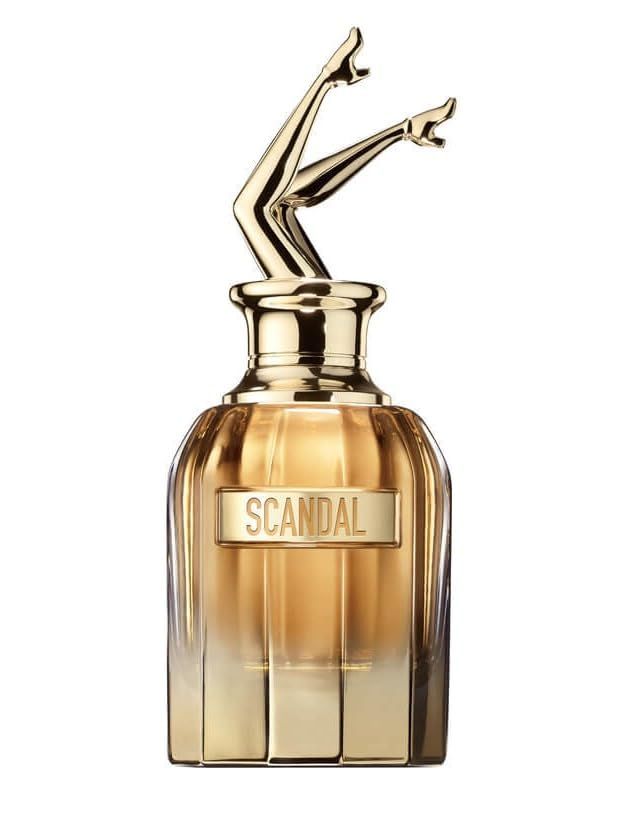 Goldfarbener Flakon mit "SCANDAL"-Schriftzug und Beinen als Verschluss. Goldener Farbton.