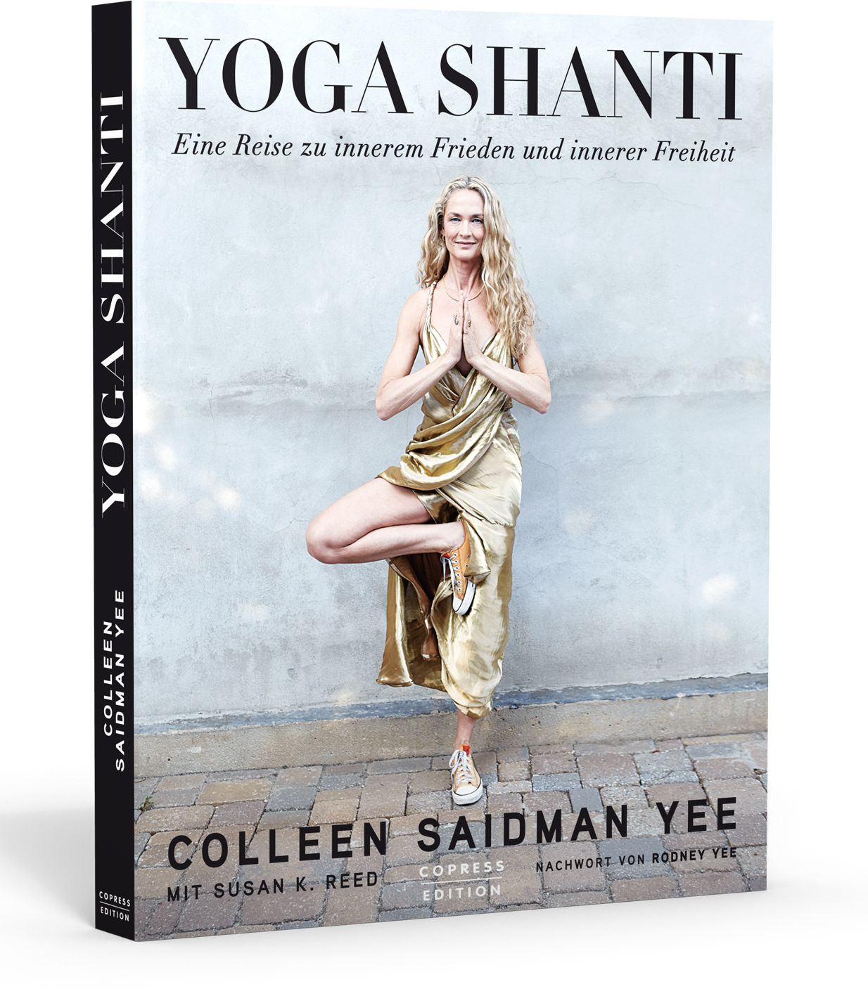 Buch "Yoga Shanti". Frau in goldenem Kleid, Yoga-Pose. Titel und Autorennamen auf dem Buchrücken.