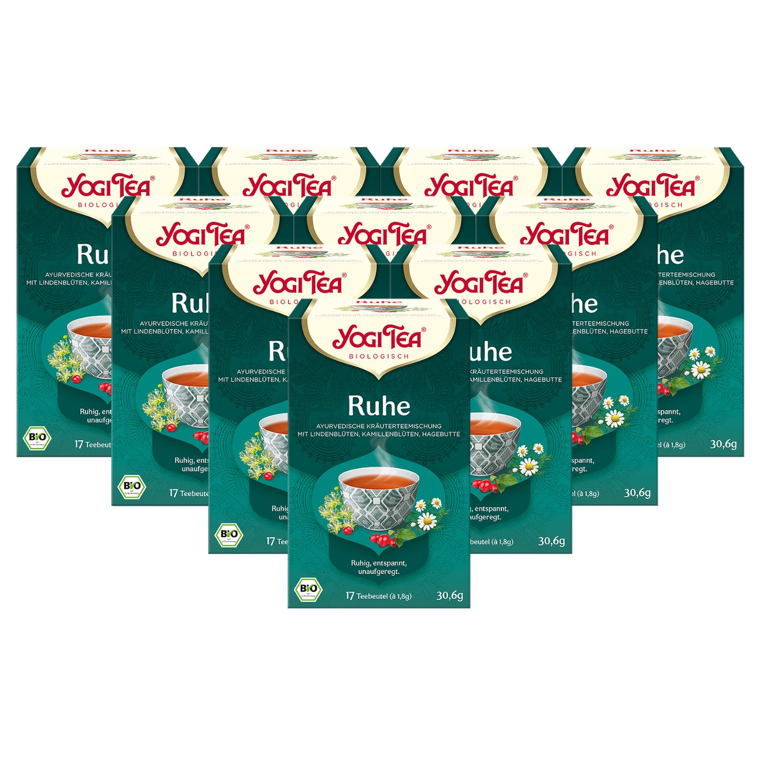 Mehrere Packungen Yogi Tea - Ruhe Bio Kräutertee. Grün-weiße Verpackung mit Logo und Produktbezeichnung. 17 Teebeutel.