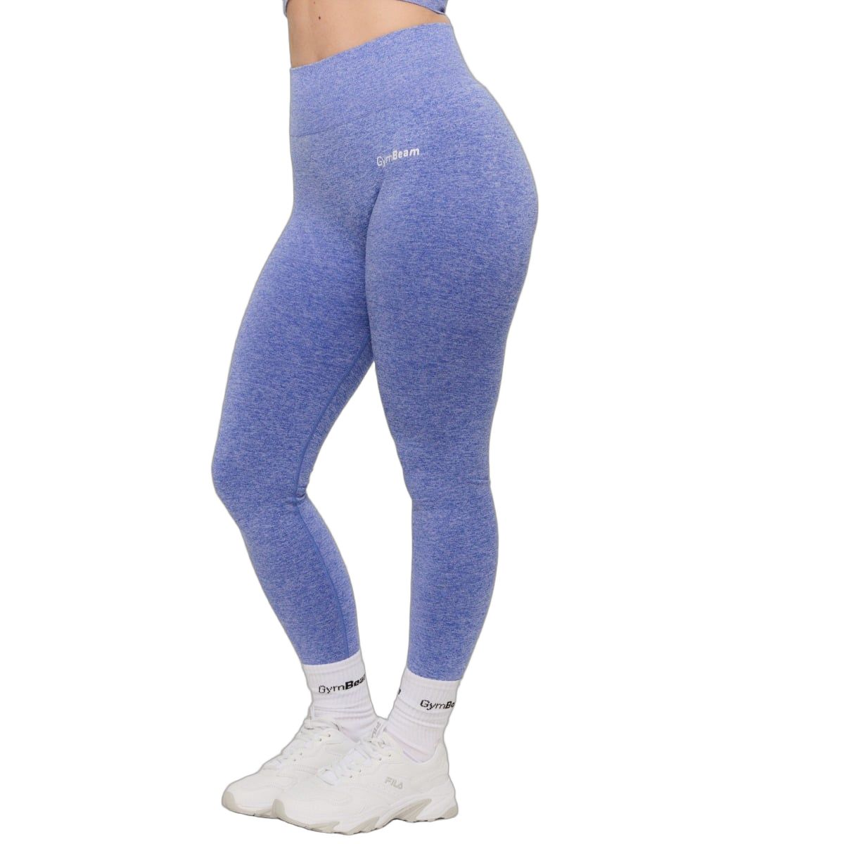 Seitenansicht einer Frau in kobaltblauer High Waist Leggings, nahtlos.