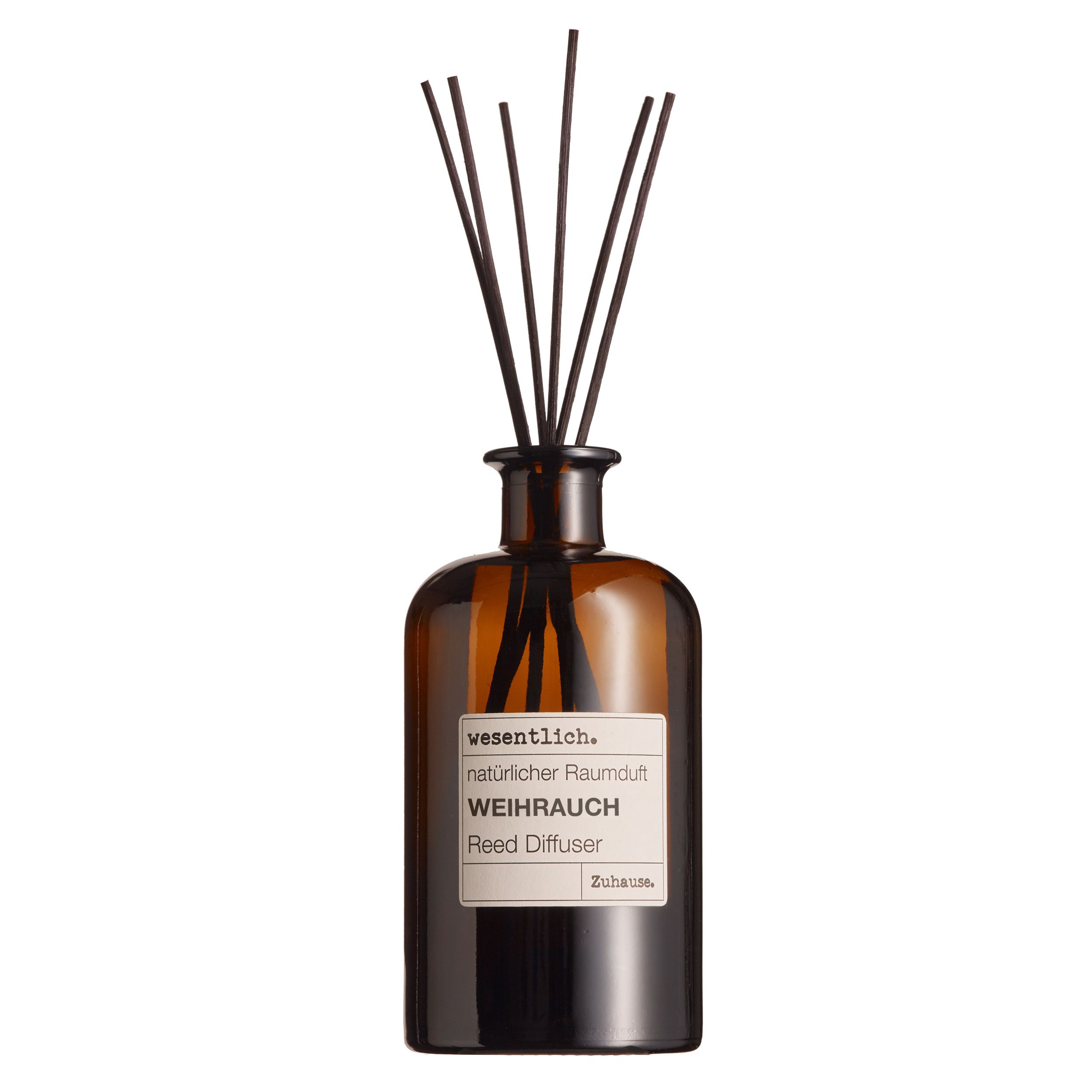Braune Glasflasche mit schwarzen Stäbchen. Aufschrift: Weihrauch, Reed Diffuser.