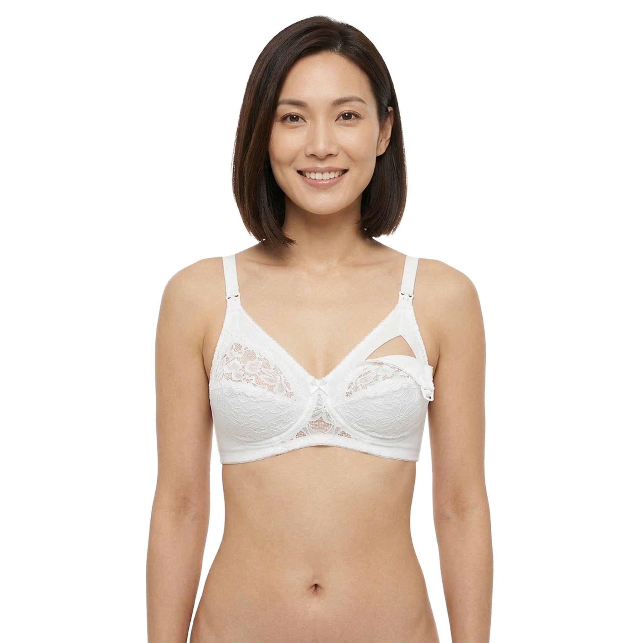 Frau trägt weißen Still-BH mit Rebrodè-Spitze. Cup B. Blick in die Kamera, verstellbare Träger.