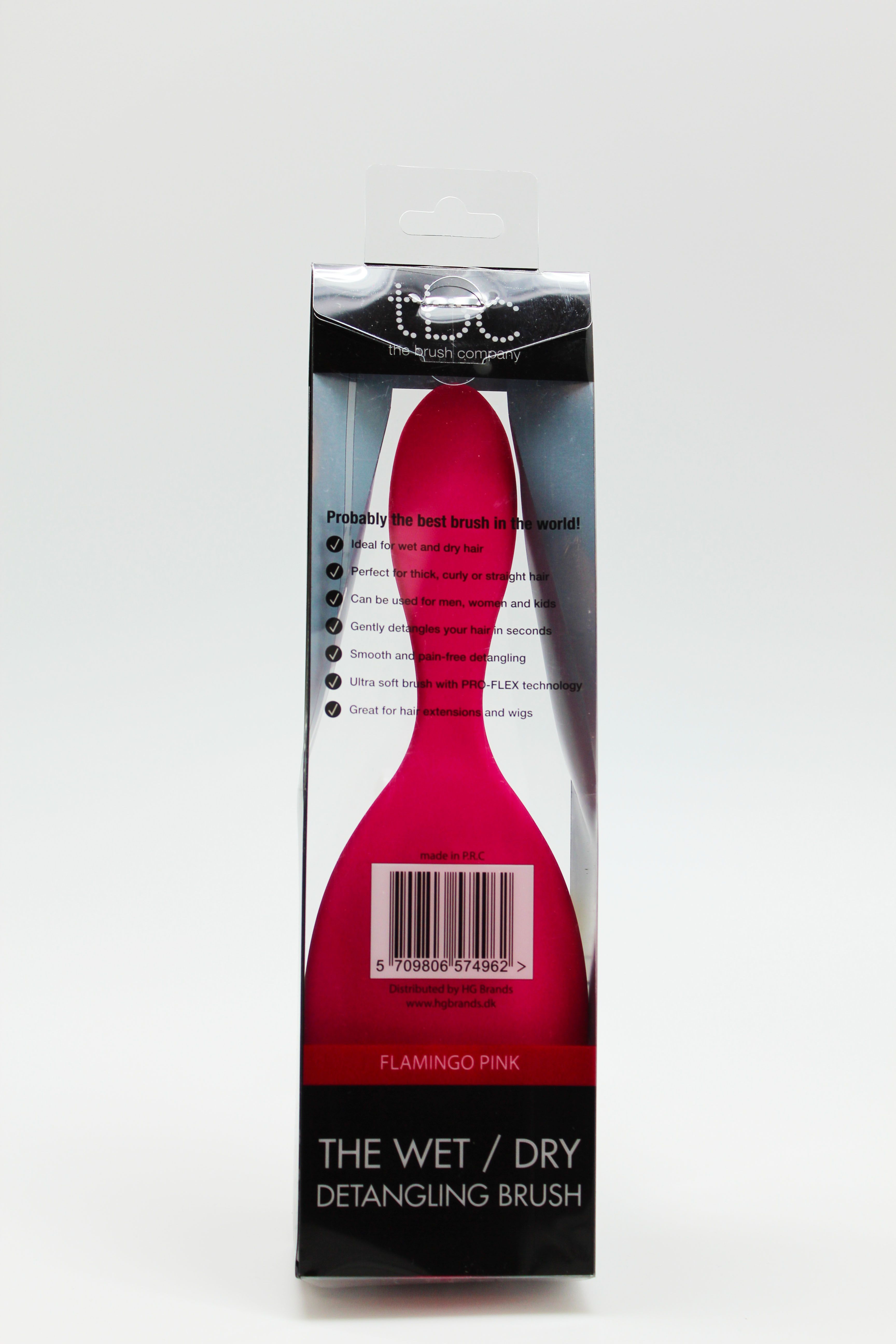 Rückseite der TBC Detangling Haarbürste Flamingo Pink in Verpackung, mit Barcode und Produktmerkmalen.