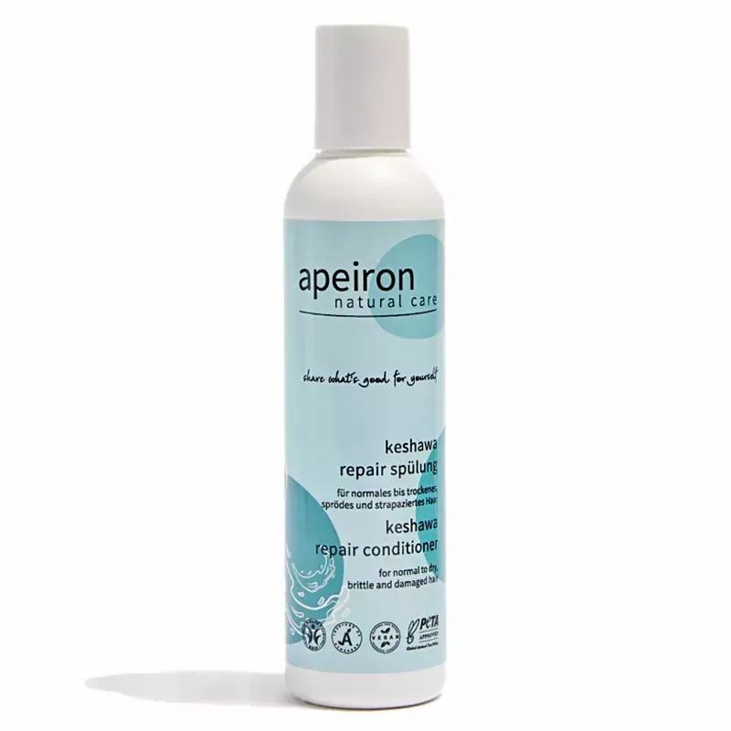 Apeiron Keshawa Repair Spülung. Flasche mit weißem Deckel und hellblauem Etikett. Text: Repair Spülung, Repair Conditioner.