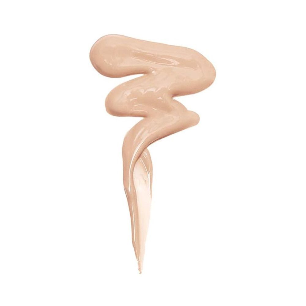 Beigefarbener Concealer-Klecks. Wellenförmige Textur, helle Farbe.