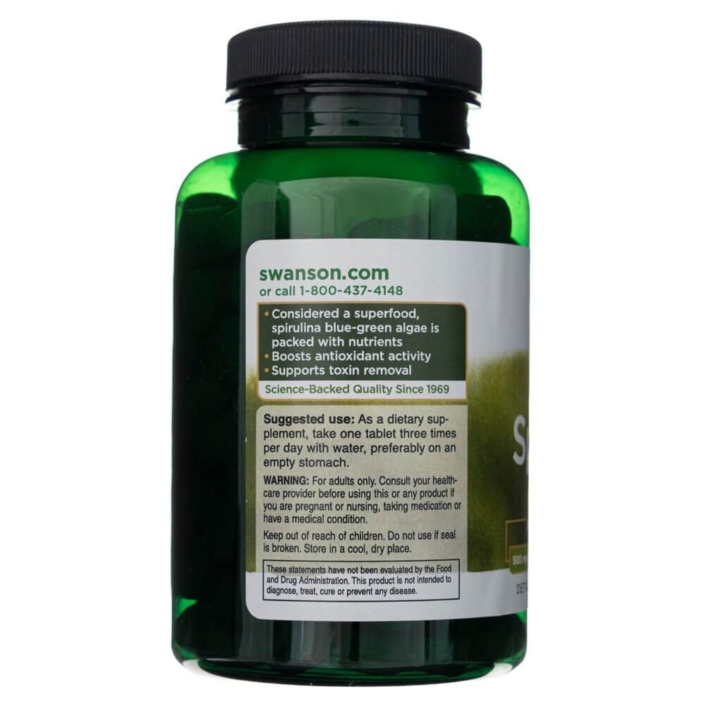 Rückseite einer grünen Flasche mit Swanson Spirulina, mit Anwendungshinweisen und Warnungen.